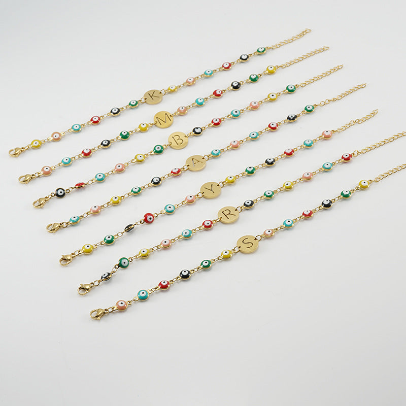 Stainless Steel Bracelet with Evil Eye Charms & Custom Letter Pendant – Gold Plated