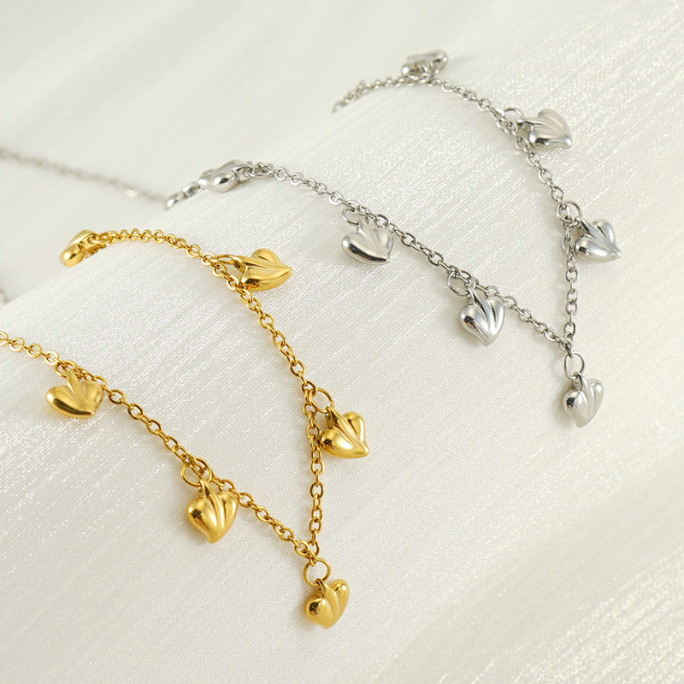 Necklace with Heart Charms in Gold